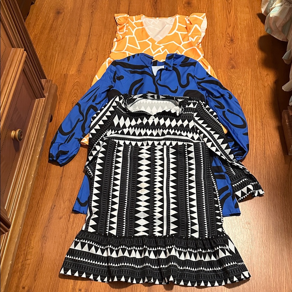 Trio of Dresses in Black, Blue, and Orange